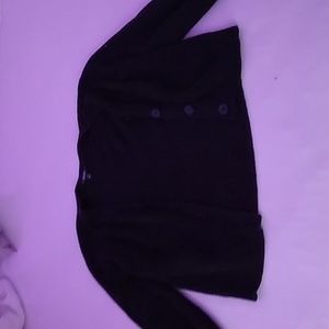 It is a black sweater from Vera wang